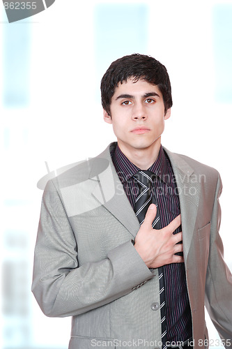 Image of young business man standing