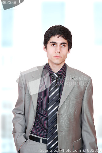 Image of young business man standing
