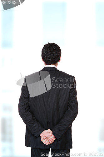 Image of young business man standing