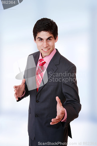 Image of young business man standing