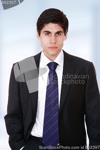 Image of young business man standing