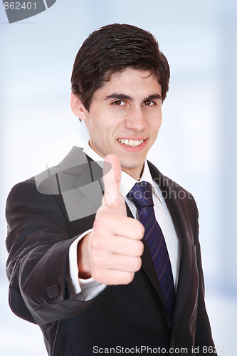 Image of young business man standing