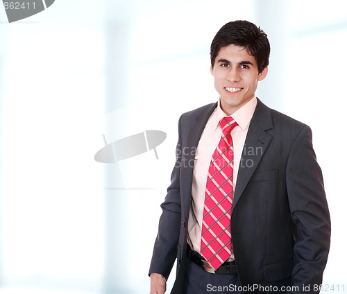 Image of young business man standing