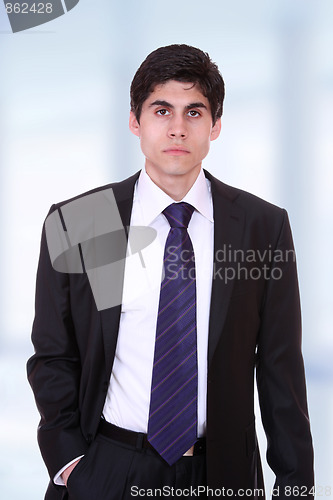 Image of young business man standing