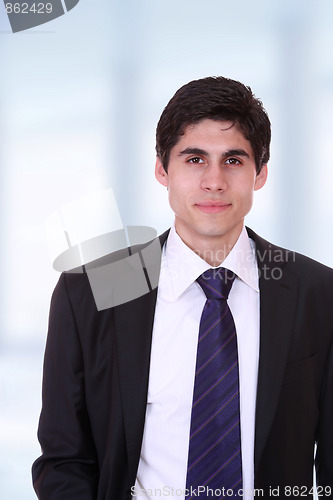 Image of young business man standing