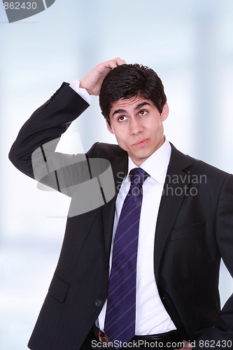 Image of young business man standing