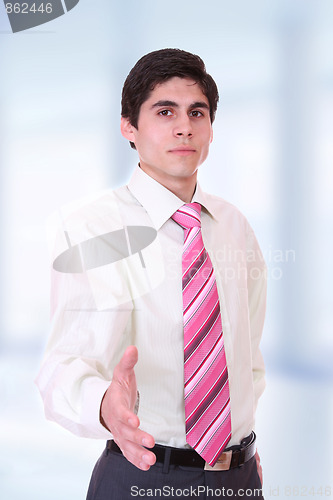 Image of young business man standing