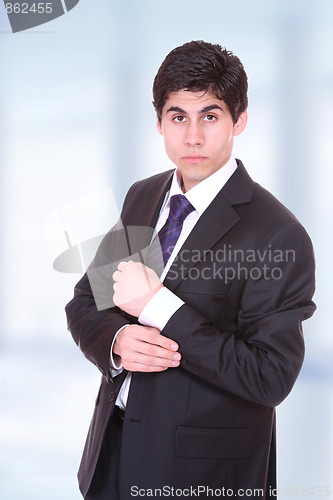 Image of young business man standing