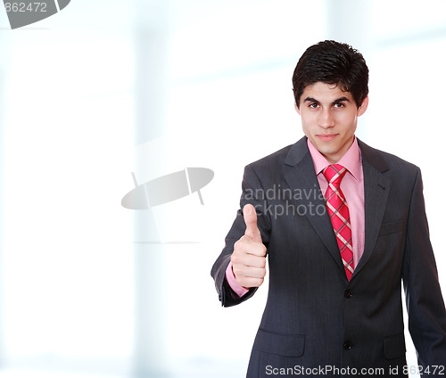 Image of young business man standing