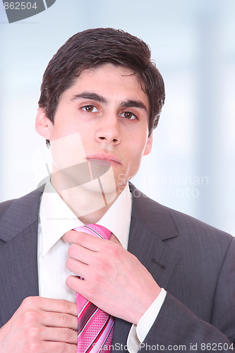Image of young business man standing