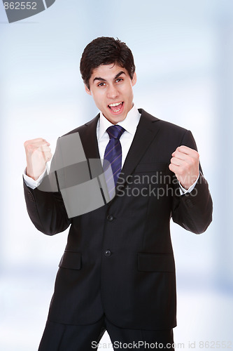 Image of young business man standing