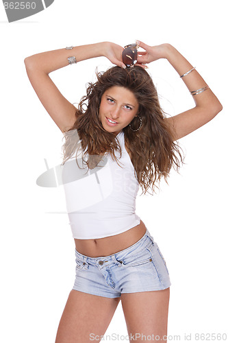Image of young woman in jeans shorts