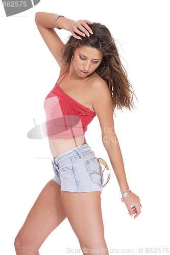 Image of young woman in jeans shorts