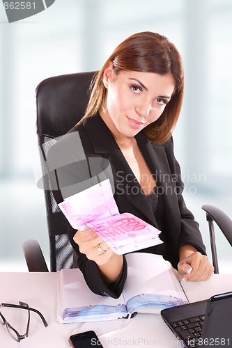 Image of young business woman standing