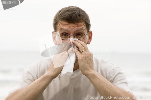 Image of Sneezing man 