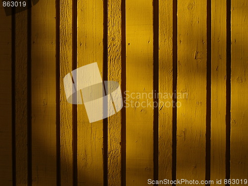 Image of yellow wooden wall