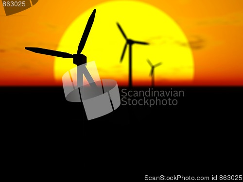 Image of Wind turbines at sunset