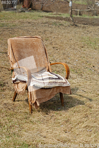 Image of garden chair with pillow