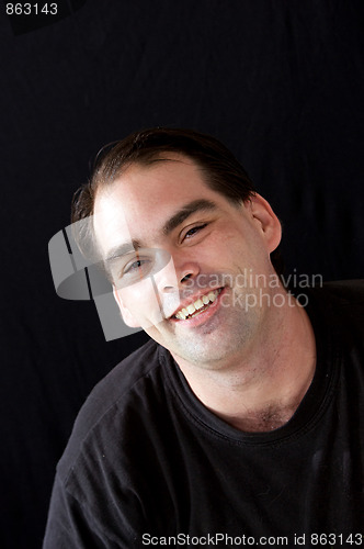 Image of man smiling with dimples