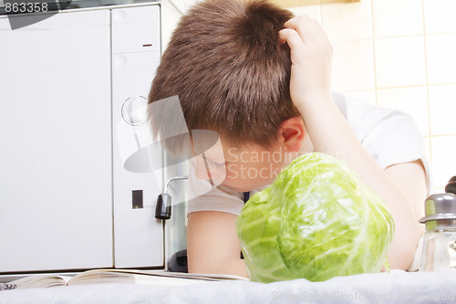 Image of Boy choosing recipe