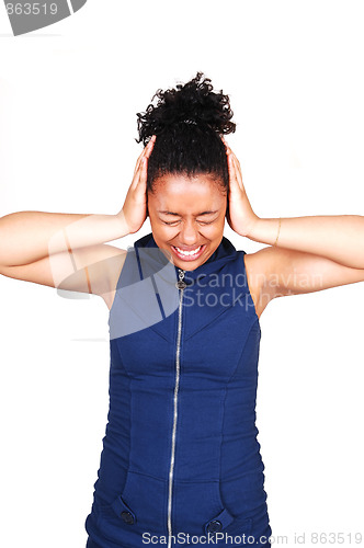 Image of Young woman in noisy place.