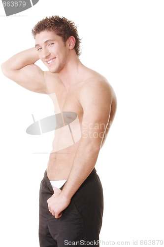 Image of Smiling guy demonstrates torso