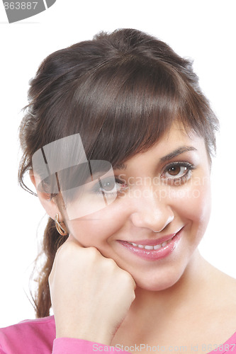 Image of Smiling brunette leaning on fist