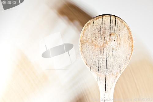 Image of Wooden spoon detail shot on white