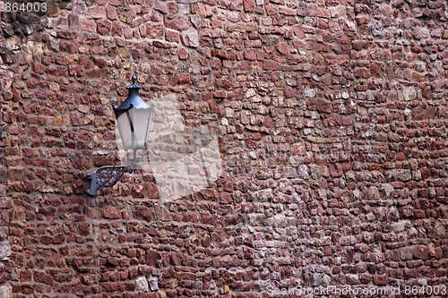 Image of Part of the old city wall with lantern in Ladenburg, Germany