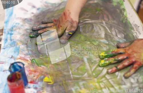 Image of Little Children Hands doing Fingerpainting