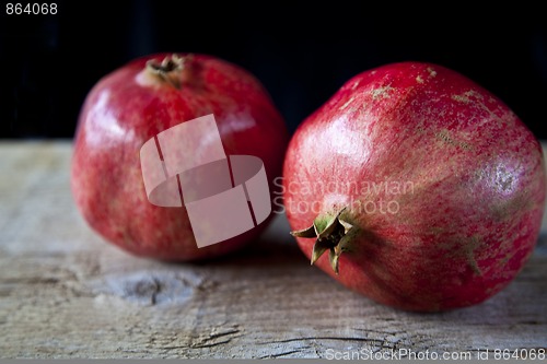 Image of Pomegranates on wooden board
