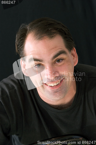 Image of very happy man with big grin