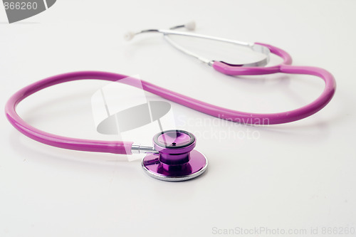 Image of pink stethoscope on white