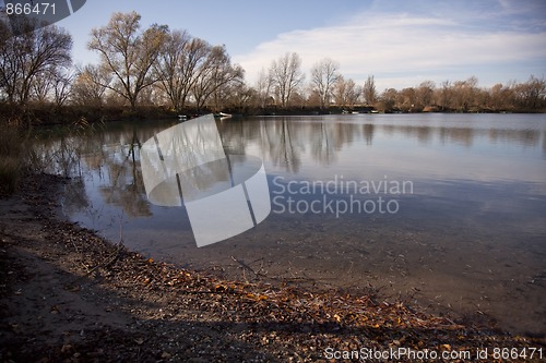 Image of Small Lake with Trees in Autumn