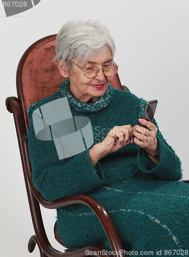 Image of Old woman with mobile phone