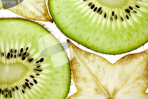 Image of Sliced Kiwi and Carambola Starfruit isolated on white