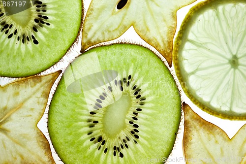 Image of Sliced Kiwifruit, Lemon and Starfruit isolated on white