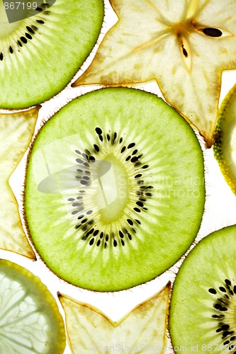 Image of Sliced Kiwifruit, Lemon and Starfruit isolated on white