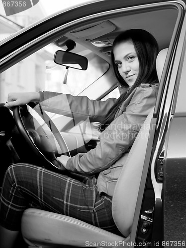 Image of Woman in automobile