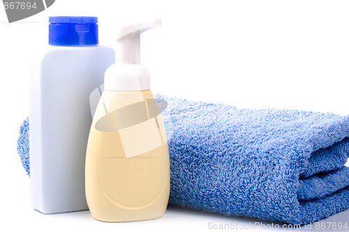 Image of body care products and towel