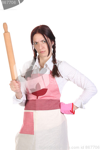 Image of mad housewife with a rolling pin