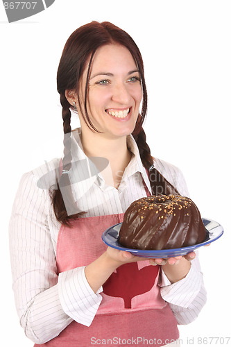 Image of housewife  with bundt cake