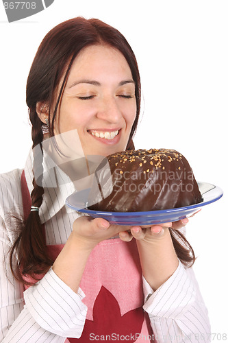 Image of housewife  with bundt cake