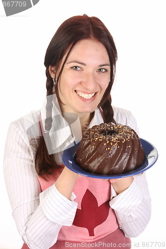 Image of housewife  with bundt cake