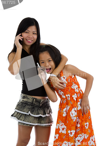 Image of mother and daughter on the phone