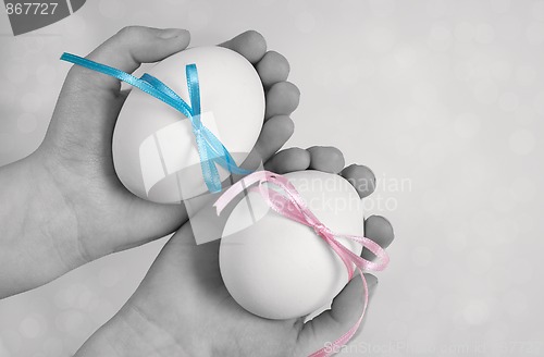 Image of Children hands holding  Easter Eggs