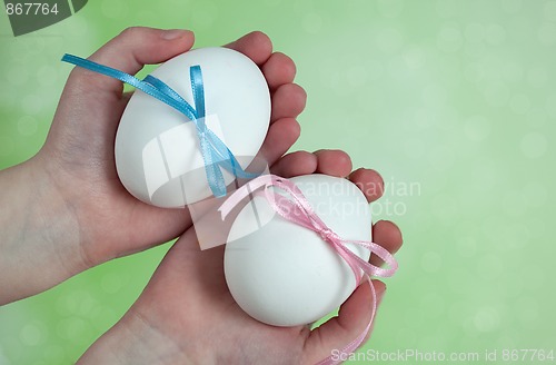 Image of Children hands holding  Easter Eggs
