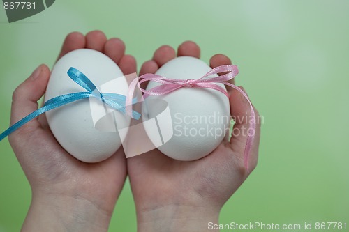 Image of Children hands holding  Easter Eggs