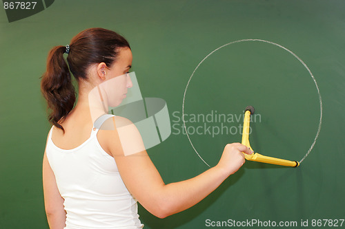 Image of teacher on the blackboard