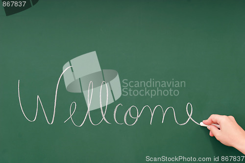 Image of Wellcome written on a blackboard